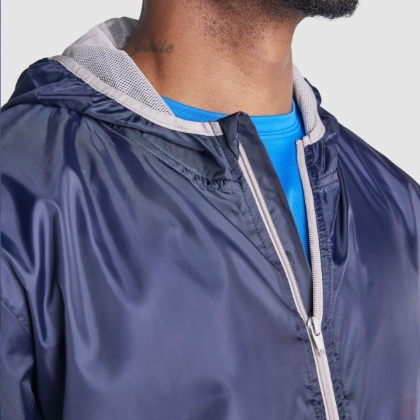 Chubasquero Cortavientos Capucha Adulto Unisex ANGELO